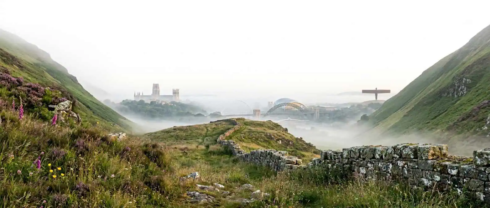 North East valley landscape with Durham Cathedral and Tyne Bridge in the morning mist